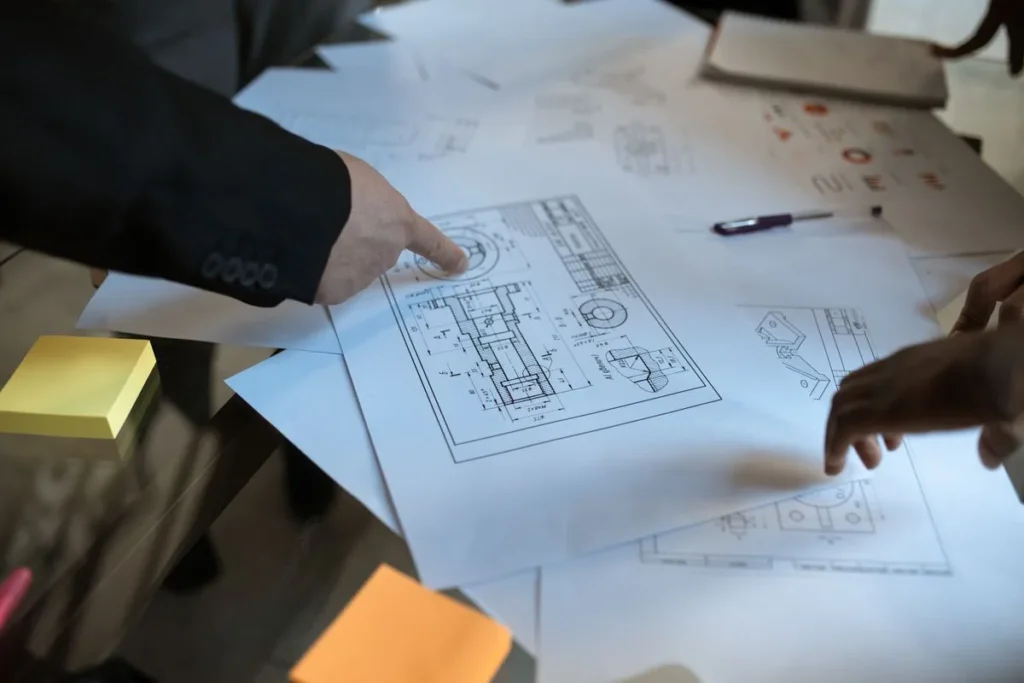 Examen de plans pour la préparation d’un dossier de consultation